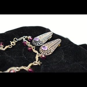 Silver earrings and the bracelet